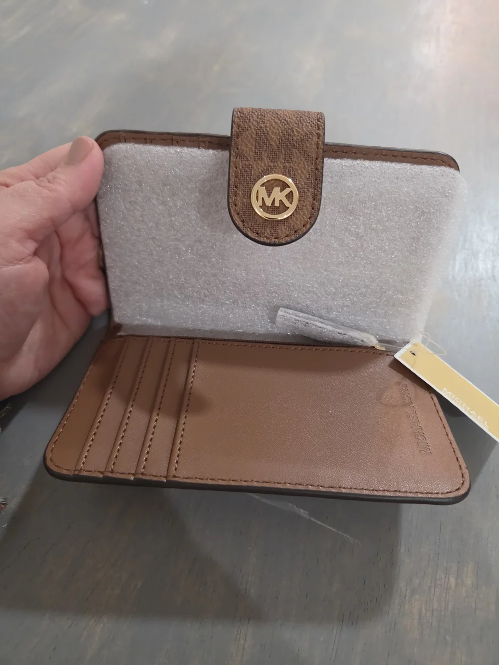 Michael Kors Brown Pebbled Leather Wallet-Style Phone Case with Gold MK Logo